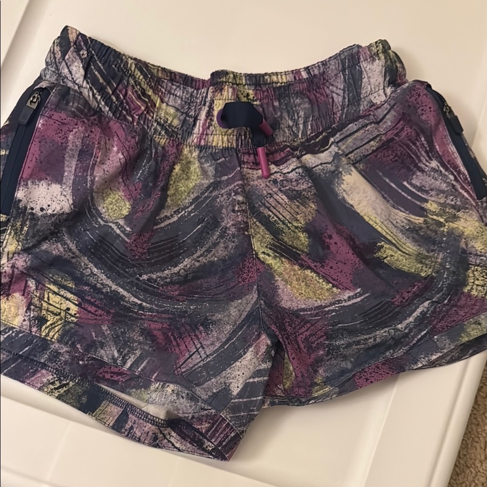 Athleta-Simone Biles- L/12 Abstract Swirl Athletic Shorts - Purple, Yellow, Navy